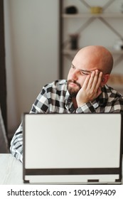 Work Problem. Routine. Lack Of Sleep. Overworking. Fatigue. Project Failure. Boring Virtual Meeting. Sad Tired Sleepy Man Sitting At The Table In His Home Office