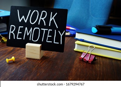 Work Remotely Sign On The Desk About Remote Job.