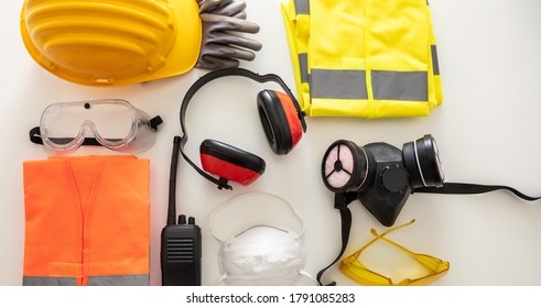 Work safety protection equipment flat lay. Industrial protective gear on white background, top view. Construction site health and safety concept - Shutterstock ID 1791085283