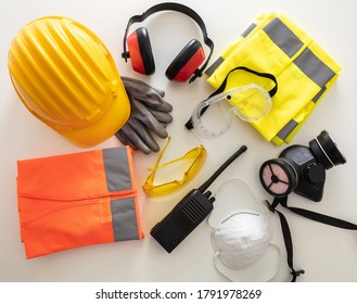 Work safety protection equipment flat lay. Industrial protective gear on white background, top view. Construction site health and safety concept - Shutterstock ID 1791978269