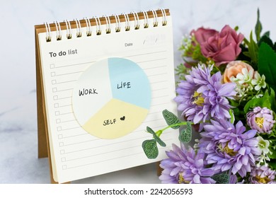 Work, self, life balance written on memo notepad , mindfulness living, self love, self care, positive thinking ,wellness , well being concept 
 - Shutterstock ID 2242056593