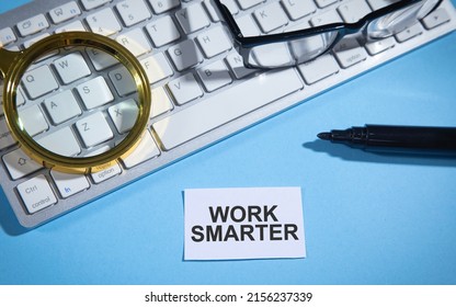 Work Smarter text on paper with a business objects.