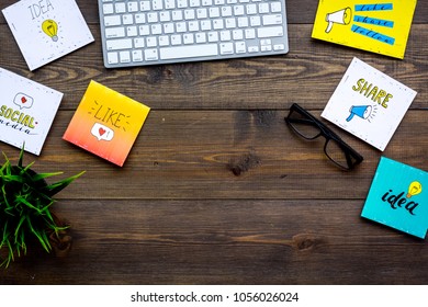 Work In Social Media. Media Marketing. Desk With Keyboard And Socail Media Icons. Dark Wooden Background Top View Copy Space