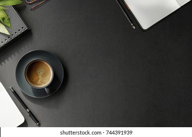 Work Space Concept : Office Dark Desk Table With Computer And Supplies. Top View With Copy Space