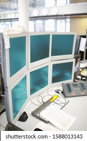 Work Station With Many Computer Monitors In Office