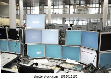 Work Station With Many Computer Monitors In Office