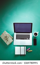 Work table space with laptop computer , flat lay