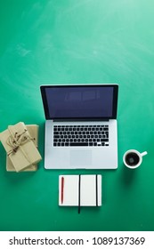 Work table space with laptop computer , flat lay
