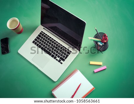 Work table space with laptop computer , flat lay