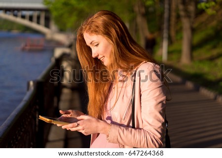 Similar – beautiful woman talking on the phone while laughing.