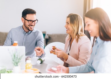 Work team having lunch break
 - Powered by Shutterstock