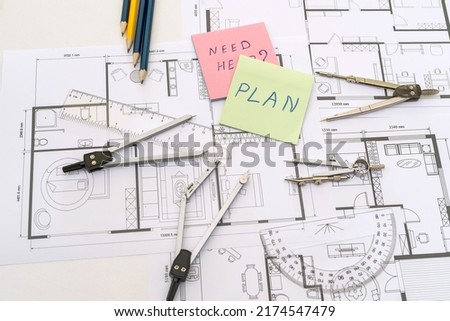 work tools with memo heen help on house plan blueprint. construction drawing project