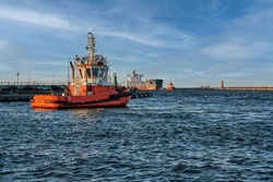 The Work Of Tugboats In The Port, Assistance For The Incoming Ship, Port Of Gdansk, Gdansk, Poland