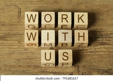 WORK WITH US Text On Wooden Cubes