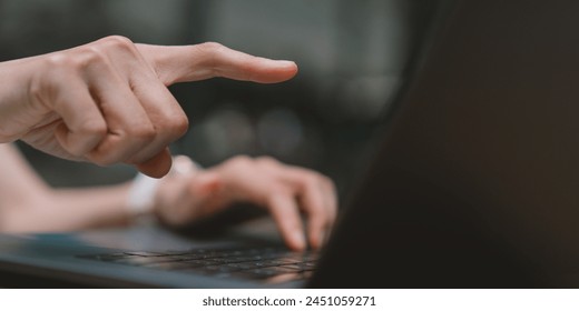 Work using laptop, pointing at computer screen, contact us, planning ideas investors internet searching, ideas connecting people.