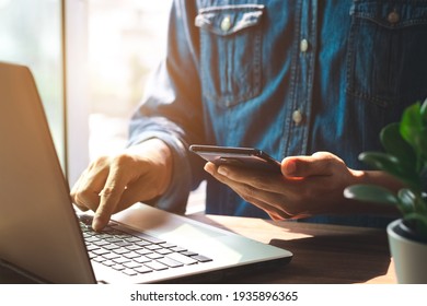 Work using mobile phone typing computer mobile chat laptop contact us at workplaces, planning ideas investors internet searching, ideas connecting people. - Shutterstock ID 1935896365