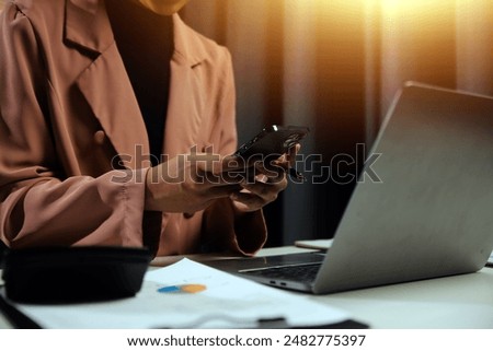 Work using mobile phone typing computer mobile chat laptop contact us at workplaces, planning ideas investors internet searching, ideas connecting people.