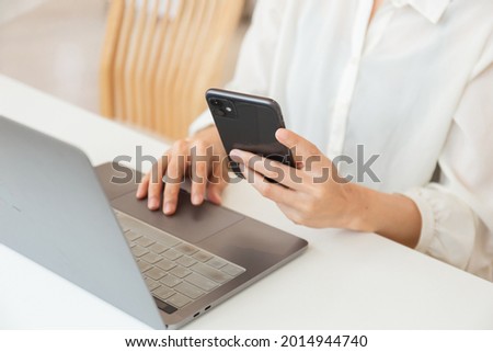 work using texting cell phone typing computer.student study education online learning.adult professional chatting on laptop,mobile contact us at Thinking business plan.connecting people concept