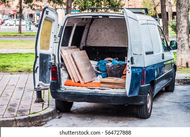 Work Van With The Door Open In The Back With Working Tools Inside