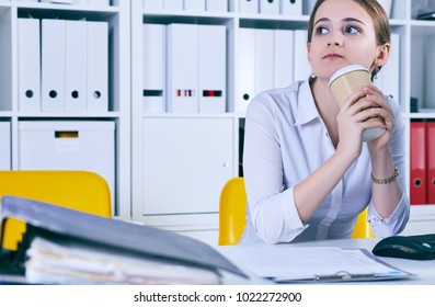 Lot Of Work Wait For Dreaming Woman With Coffe In Hans. Huge Pile Of Document Folders, Headache And Depression, Irs, New Problems, Emotion Expression, Vacancy Or Holiday Dream Concept