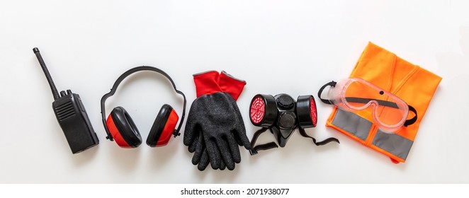 Work Wear Safety Protection Equipment Isolated On White Background, Personal Protective Gear, Top View. Industrial Construction Site Health And Safety Concept