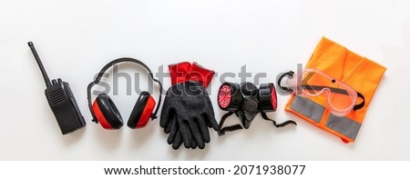 Work wear safety protection equipment isolated on white background, personal protective gear, top view. Industrial construction site health and safety concept