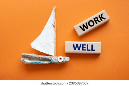 Work Well symbol. Concept word Work Well on wooden blocks. Beautiful orange background. Business and Work Well concept. Copy space - Shutterstock ID 2395087057