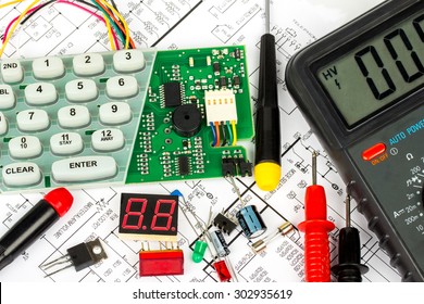 Workbench For Alarm Electronics Repair, Electronic Diagram, Multimeter, Electronic Components, Electronic Board, Screwdrivers, Transistors, Integrated Circuits, Capacitors, LED