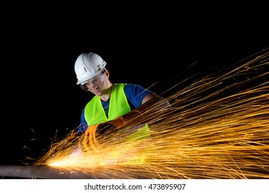 Worker With Angle Grinder