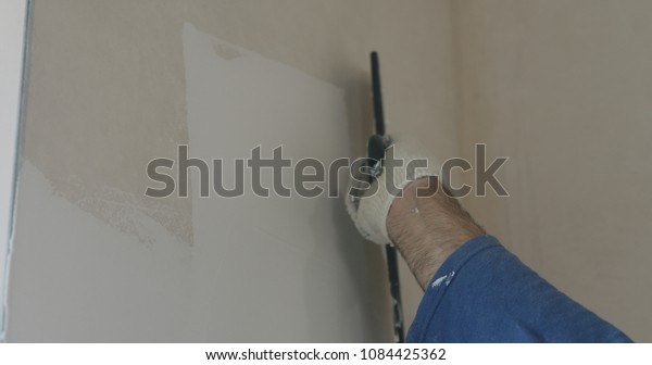 Worker Applying Putty On Wall Stock Photo Edit Now 1084425362
