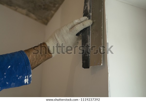 Worker Applying Putty On Wall Putty Stock Photo Edit Now 1119237392