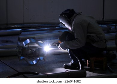 Worker argon welding