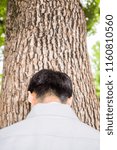 Worker and big tree