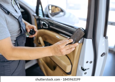 Worker With Brush Wipes Car Door Trim, Detailing