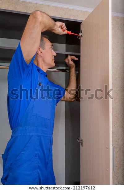 Worker Build Wardrobe Stock Photo Edit Now 212197612