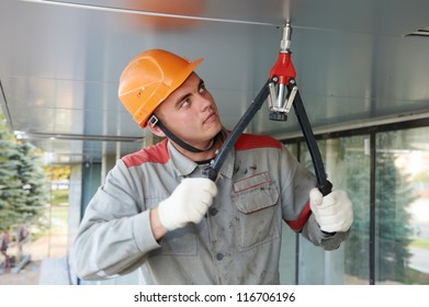 Worker Builder Doing Facade Works With Heavy Duty Lever Type Hand Rivet Tool