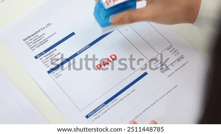 Worker busy work seal getting paying symbol on sales bill form report paper stack. Pay off full amount income tax fee past due date sale office job task. Cash flow debt credit loan risk control budget