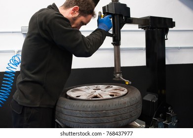 worker changing a tyre