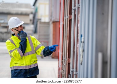 Worker check list of container cargo at container depot terminal,Working inspection audit logistic transportation concept.