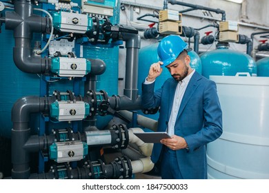 Worker Checking Chemical Water Treatment Equipment