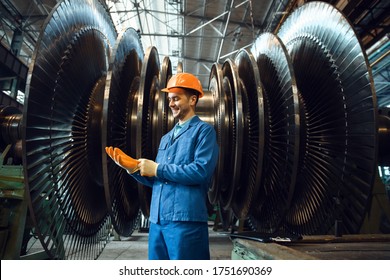 Worker Checks Turbine Impeller Vanes On Factory