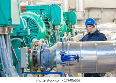 Worker controls quality of work in the factory hall