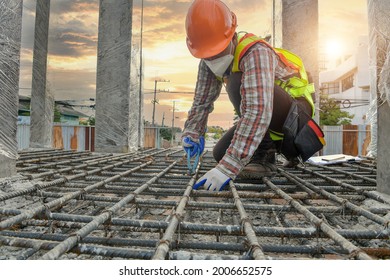 Worker With Contruction Iron Lines For Building Foundation,Construction Worker