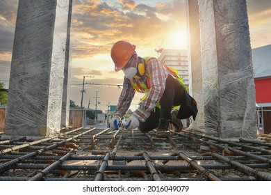 Worker With Contruction Iron Lines For Building Foundation,Construction Worker