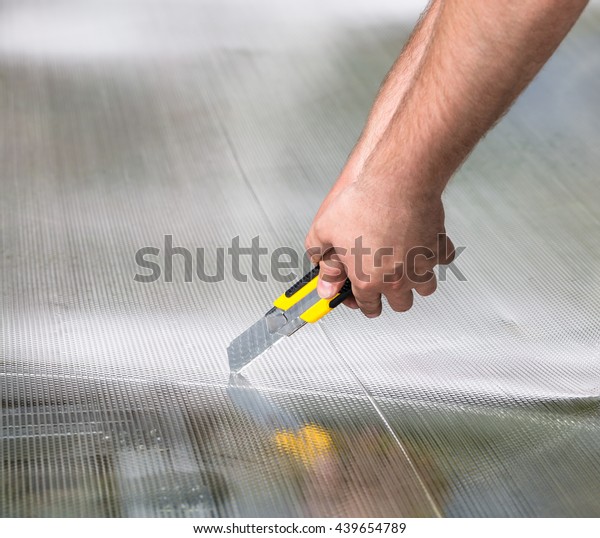 Worker Cutting Polycarbonate Knife Building Greenhouse Stock Photo Edit Now 439654789