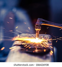 Worker Cutting Steel Pipe Using Metal Torch And Install Roadside Fence