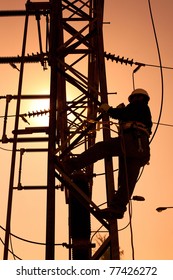 Worker At An Electric Substation