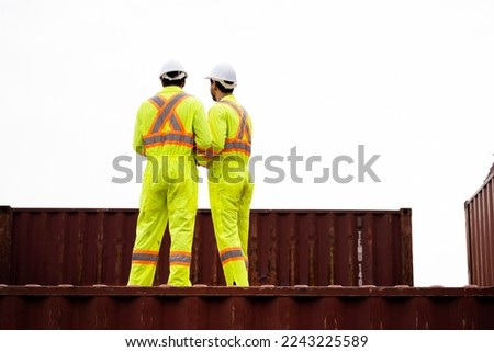 worker or engineer export management team inspecting containers To manage the export of goods to foreign countries Large cargo shipping, container yard.