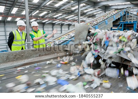 Image, Stock Photo Protected process: businessman holds hands over gears