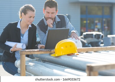 Worker And Female Boss Outside Factory